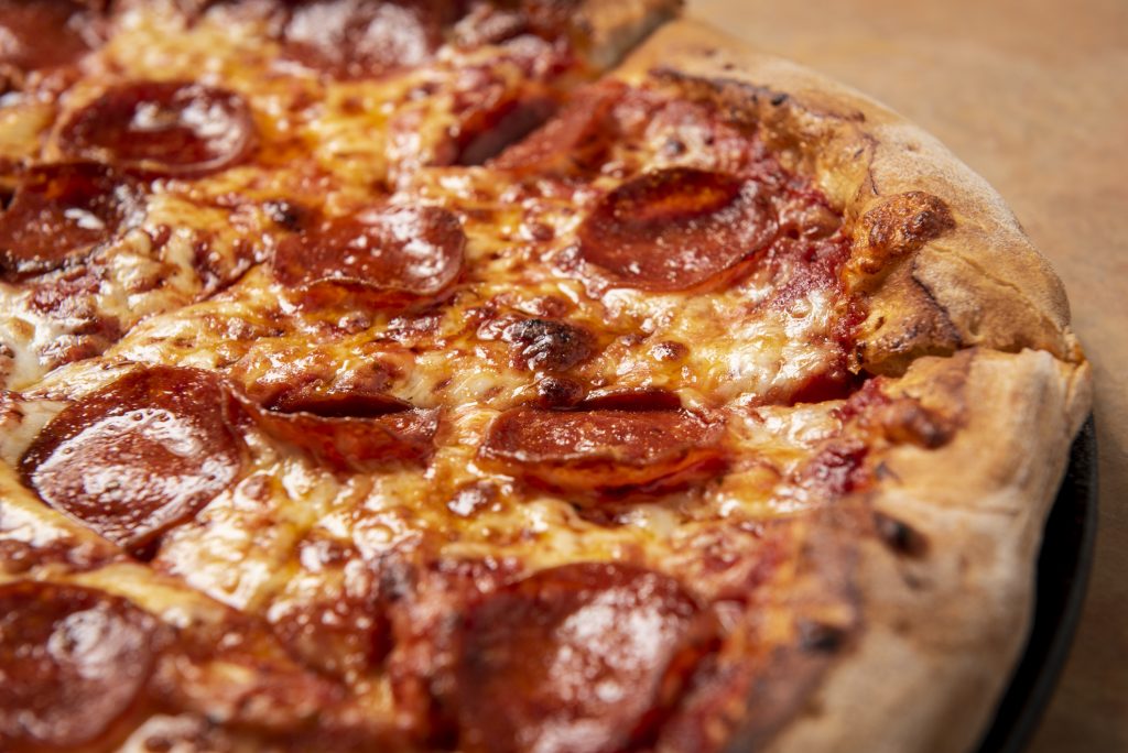 Pepperoni Pizza closeup ( About Us )